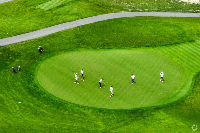 Westwood residents play a round of golf at one of the town's many country clubs.