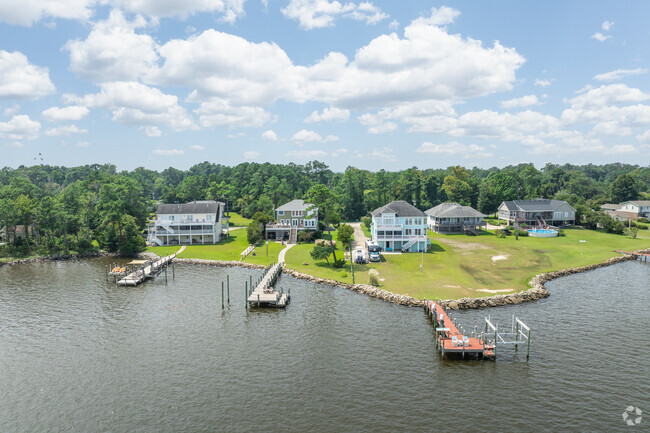 Waterfront homes in Manns Harbor sell for $500,000 to $900,000.