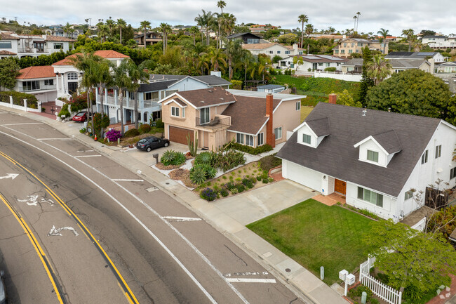 The homes in La Jolla Mesa sit along winding hilly roads and have stunning views.