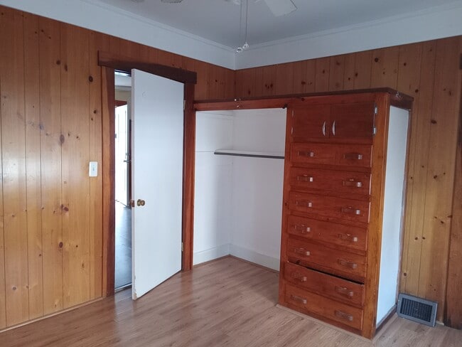 Bedroom with built in bureau