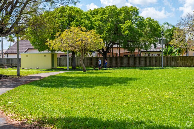Residents often walk dogs along trails at Lago Mar Park.