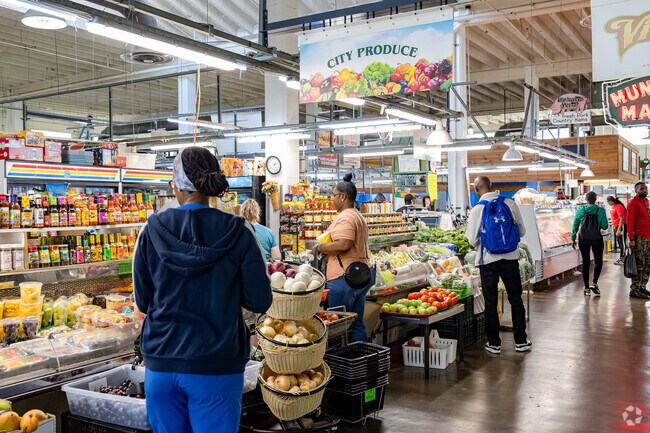 Shopping for meats, produce, and craft foods can be done at the Sweet Auburn Curb Market.