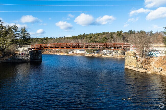A footbridge along the Goffstown Rail Trail crosses over the Piscataquog River in Pinardville.