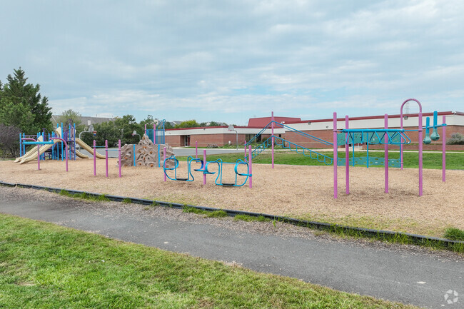 Dominion Trail Elementary School offers a large playground for its students to enjoy.