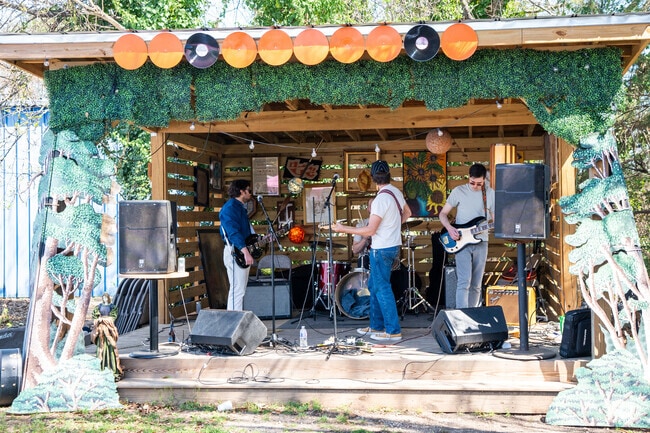 Bands perform at the Ajja market in Five Points East, during the monthly market.