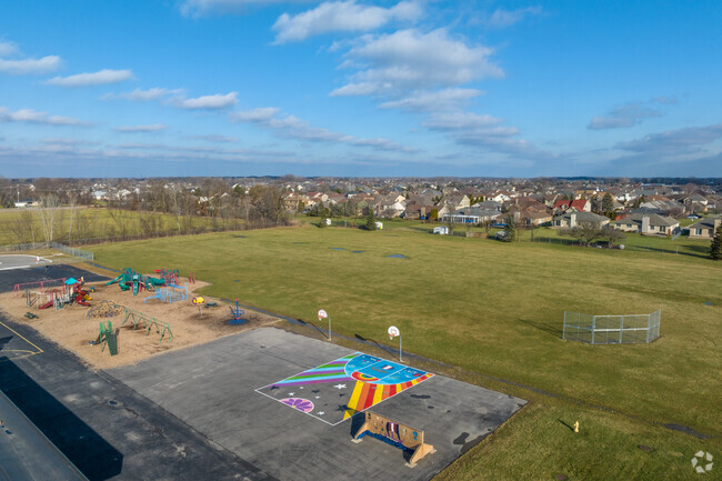 Playground and field at Beck Centennial Elementary School.