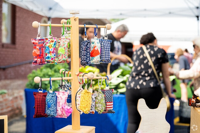 Hand-crafted goods, from keychains to dog collars, are available at the Conimicut Farmers Market in Conimicut-Shawomet.