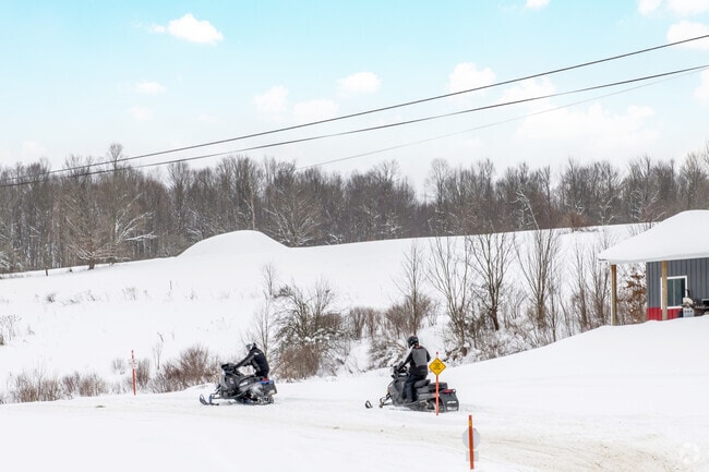 Snowmobiling through the scenic hills surrounding Kiantone is a favorite winter pastime, with miles of well-kept trails.