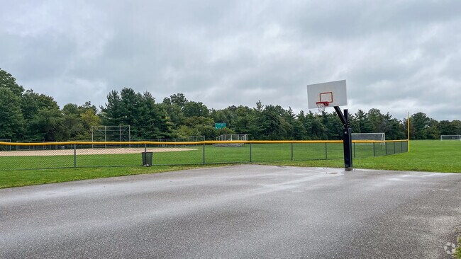 Harry B. Thompson has a half court recreational basketball court in front of the school.