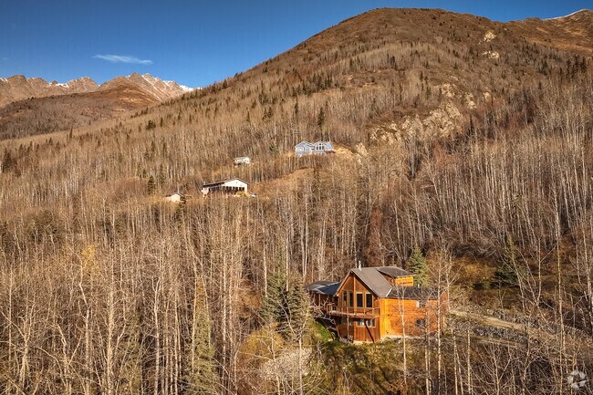 Log cabin homes perched upon the hillsides of Eagle River Valley offer spectacular views.
