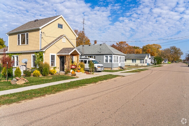 A residential street in Dalzell featuring early- to mid-20th-century homes, reflecting the town’s historic working-class heritage and timeless small-town character.
