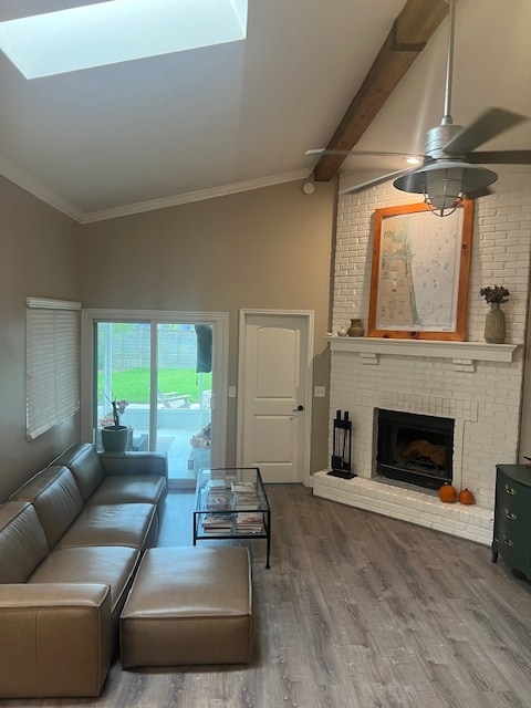 Spacious, open living room with fireplace focal point and patio access.