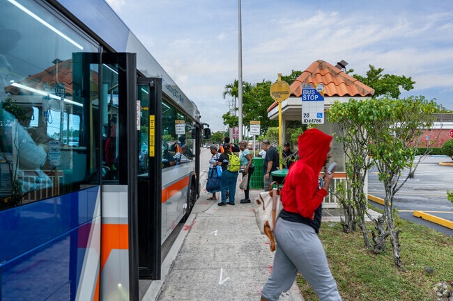 Residents rely on public buses for their daily work commute in Miramar Tropical.
