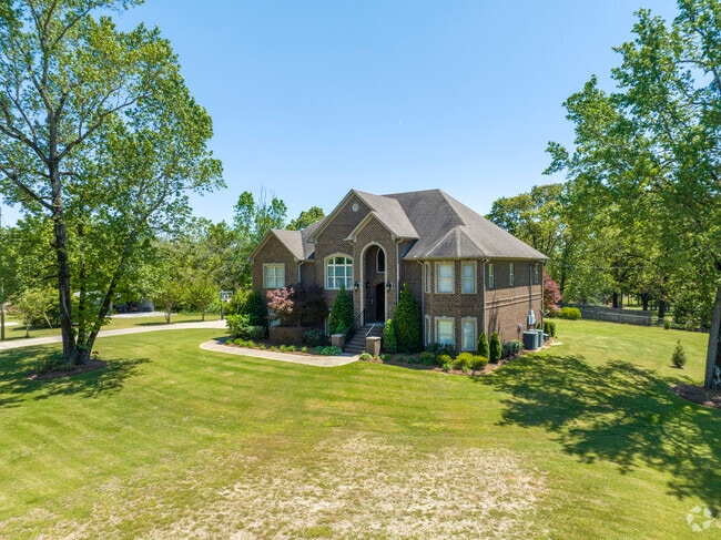 Calera is home to many red brick homes in the Tudor Revival style.