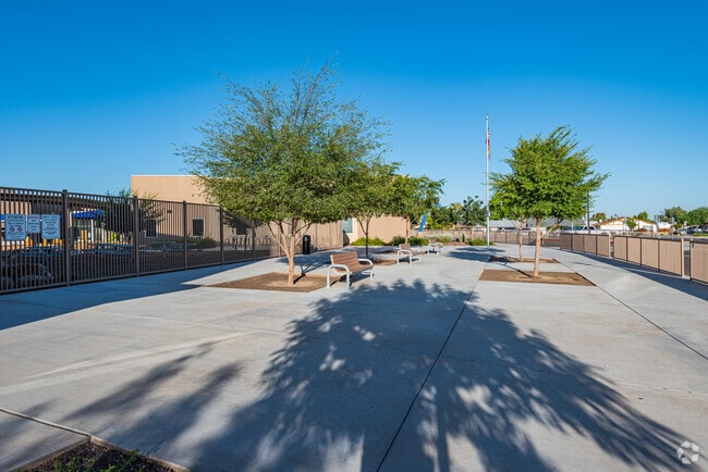 Common seating area just outside main gate, Nevitt Elementary School.