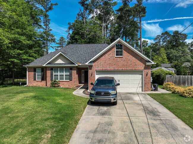 A brick bungalow in Montlcair a neighborhood of the greater Augusta, GA.