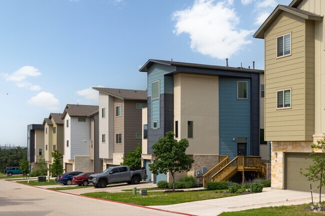 A row of modern contemporary townhomes located just outside Circle C.
