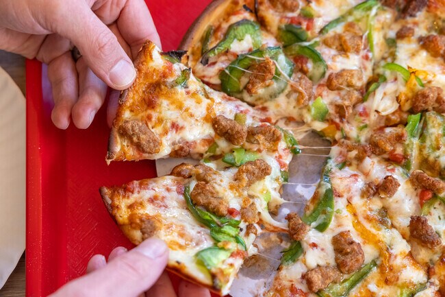 Locals love the sausage and pepper pizza from Crow Point Pizzeria.