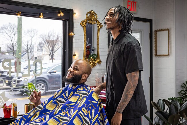 Smiles all around at Clipperhands Social Club, a top rated barber shop in South Plainfield.