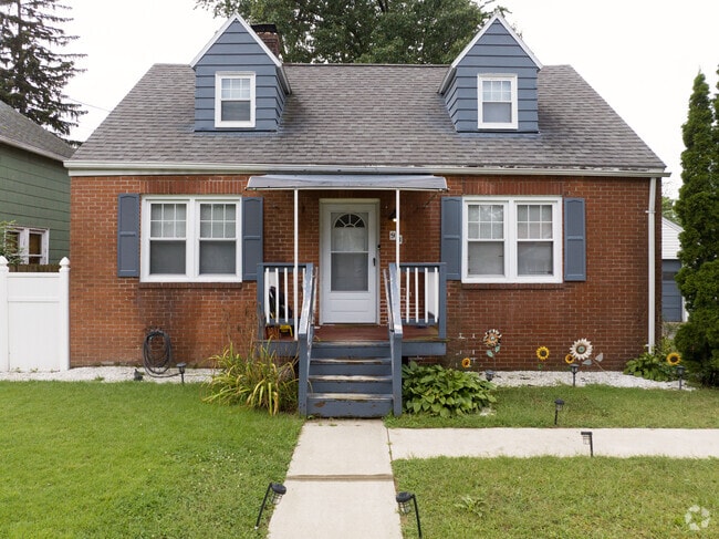 A brick cape cod in Liberty Heights.