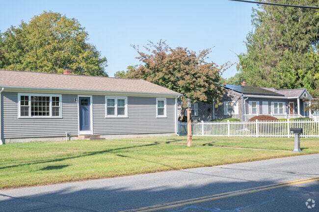 Ranch-style homes are frequent along streets in North Apponagansett.