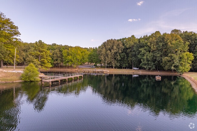 Muse Park is a beautiful shaded park that features a peaceful lake.