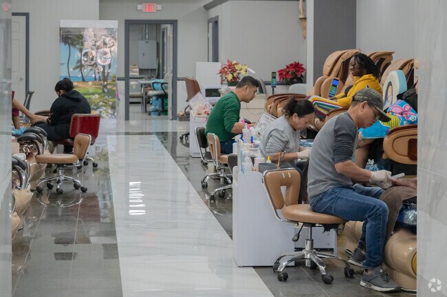 Get your nails done at the Nail Palace in Central Park.