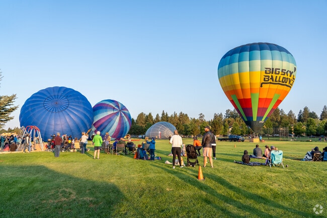 As balloons rise, so does the sun at Balloons Over Bend in the Old Farm District.