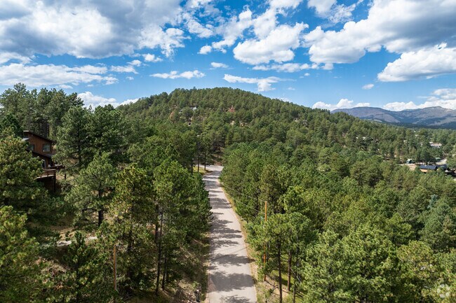 Enjoy the scenic route all through Pine Brook Hill.