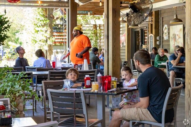 Smoke BBQ Restaurant & Bar, a family-owned favorite in Warwick on the James, offers delicious smoked meats and brick-oven pizzas.