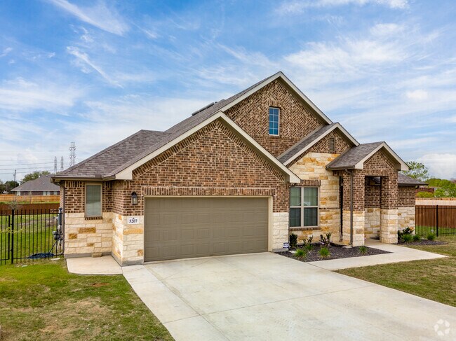 Southeast Side homes often come with large driveways or garages.