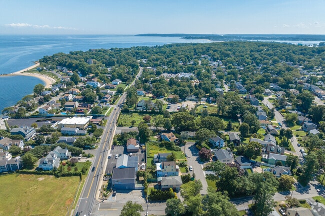 Lattingtown offers waterfront access and country club amenities.