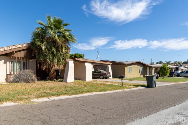 Locals in El Pueblocito maintain their yards.