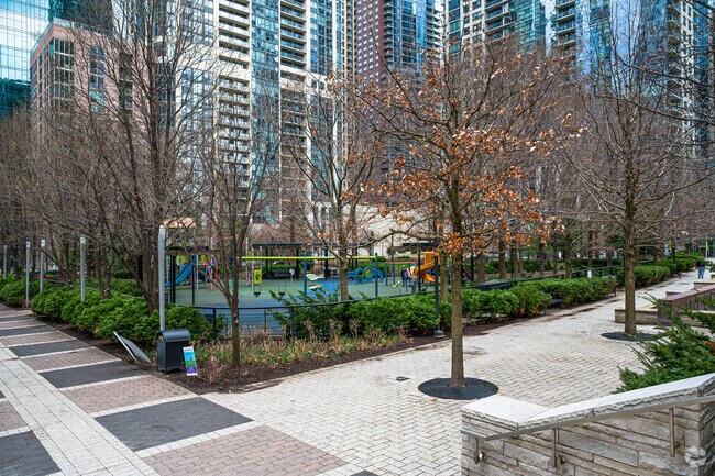 Walking trail and playground at Lakeshore East Park.