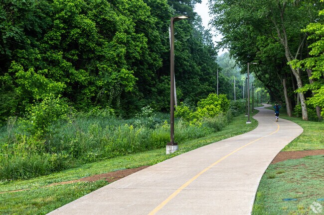 Scenic trails for walking and biking await visitors to Lake Atalanta, east of Rogers.