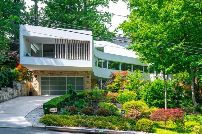A stunning modern home built into a hill in the Crestwood neighborhood.