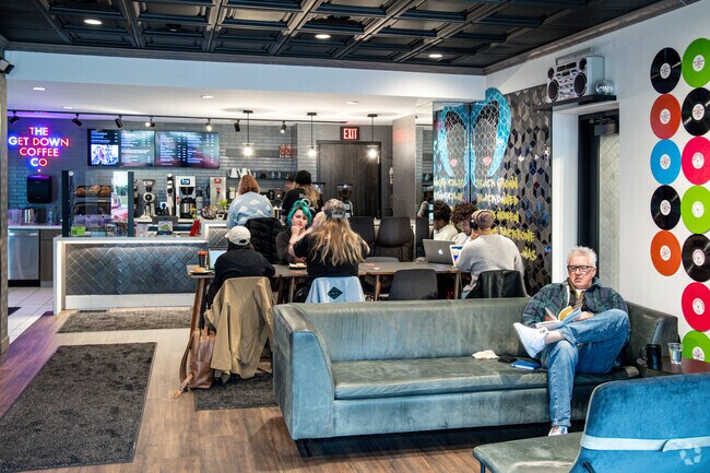 Locals enjoy The Get Down Coffee Co., a Black-owned coffee shop and roastery in Webber-Camden.