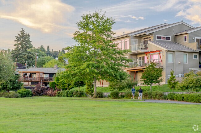 Large condos sit along Lions Park offering water & mountain views in Sheridan Park WA.