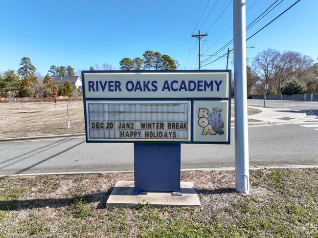The sign at the entrance to River Oaks Academy.