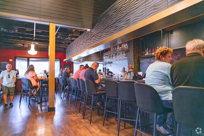 Locals gather at  Stir Martini Bar & Kitchen to catch up with friends and family as they enjoy a delicious dinner.