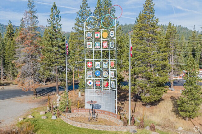 Alpine Meadows welcomes visitors and locals with its Olympic entry sign.