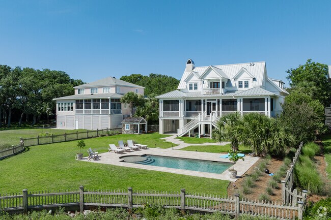 Find towering waterfront homes with spacious yards and pools at Old Village in Mount Pleasant.