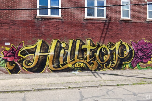 Central Hilltop's mural proudly showcases the neighborhood's name in vibrant colors.