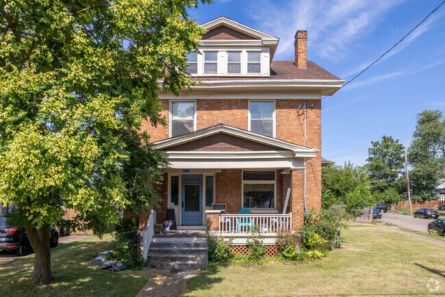 Elmwood Place features classic foursquare homes with spacious front porches.