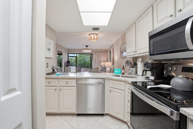 600 Neapolitan Way unit FL1-ID1073549P, Naples, FL 34103 - photo 5