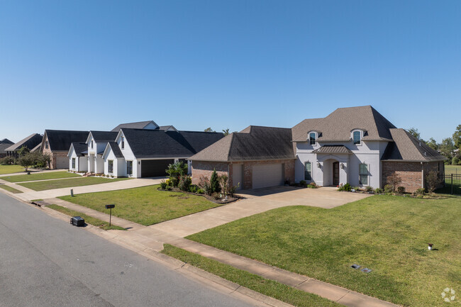 These homes typically feature steep, gabled roofs and wide porches.