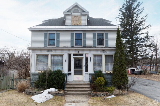 You can find many homes in Gloversville like this American Foursquare that need some tender loving care.