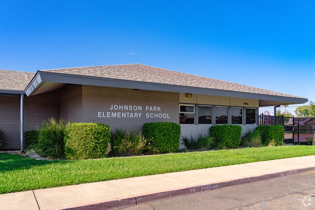 Sign welcomes students and visitors to Johnson Park Elementary School.