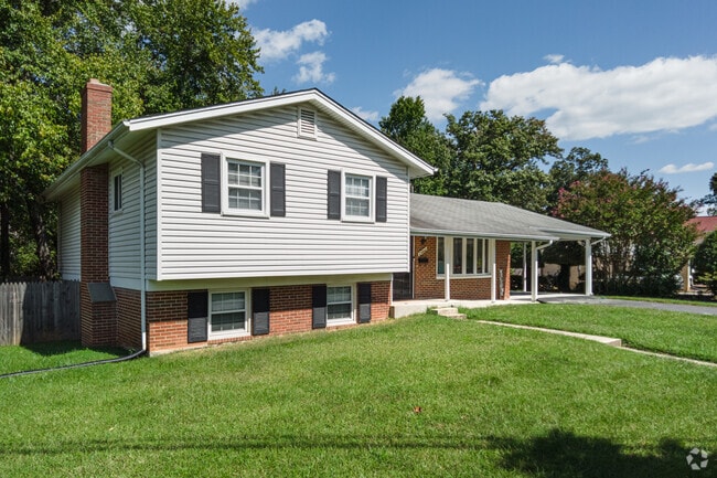Low-pitched split-level homes in Goddard maximize interior space.