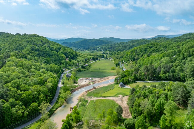 Vilas, NC, is nestled in the Blue Ridge Mountains at an elevation of 2,746 feet, offering scenic views and access to outdoor activities like hiking and fishing.